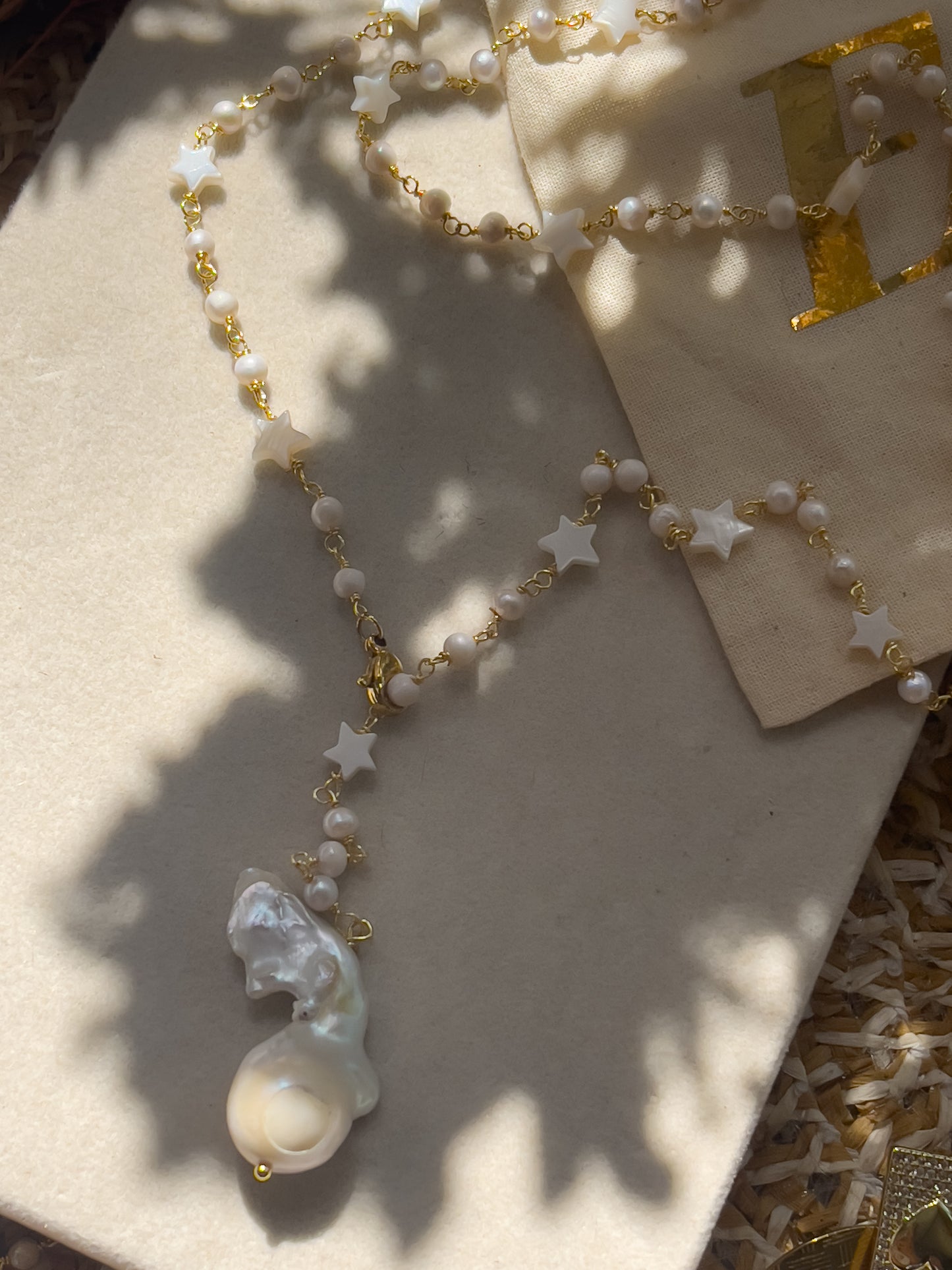 Collar perla y estrella