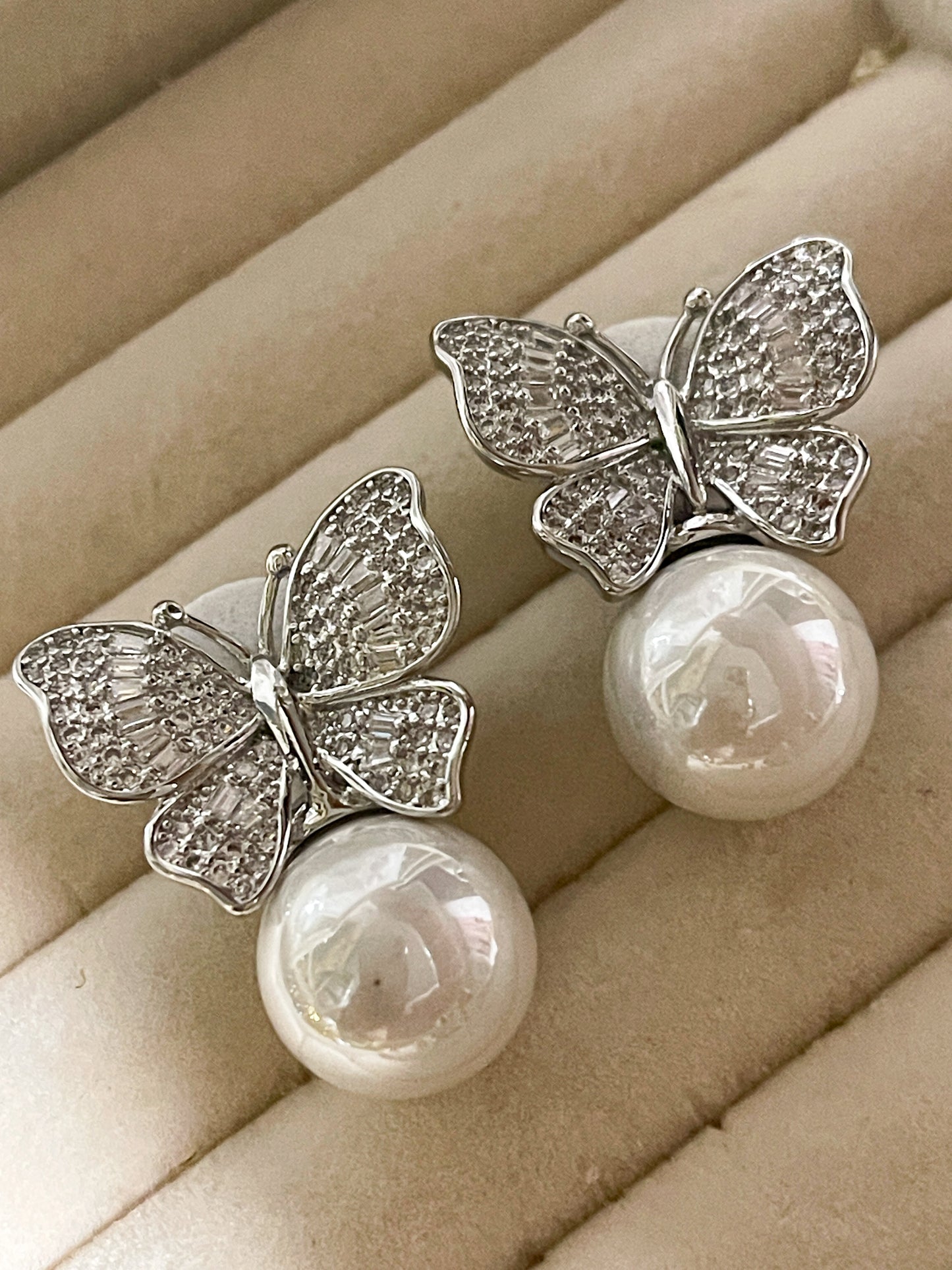 Arete mariposa silver