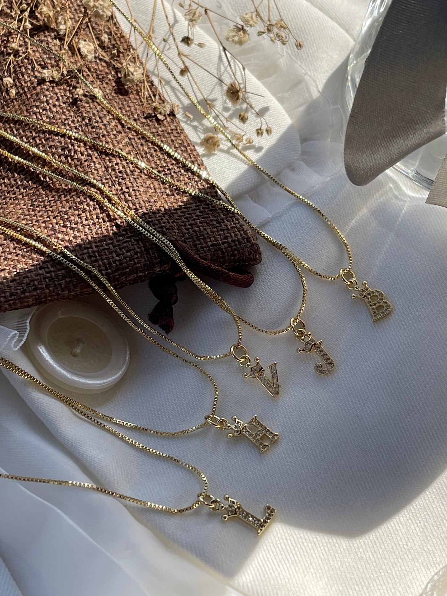 Cadena ajustable con inicial