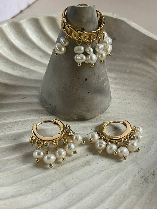 Anillo y aretes