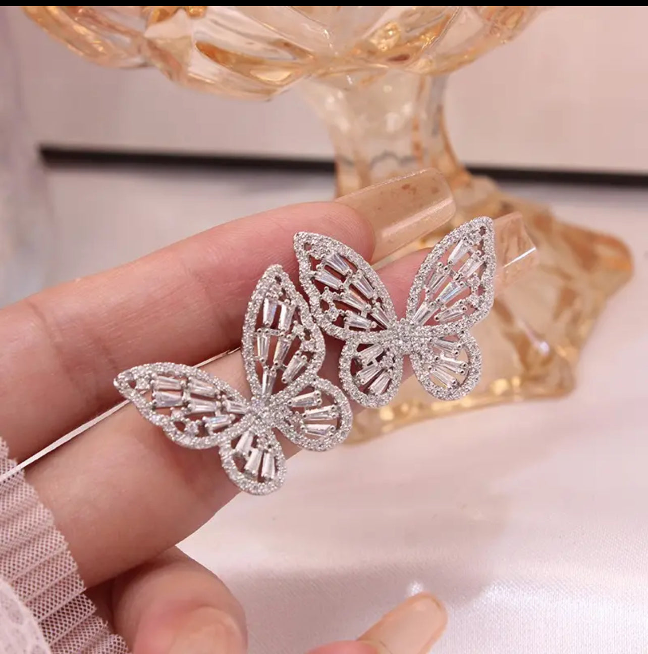 Arete mariposa silver